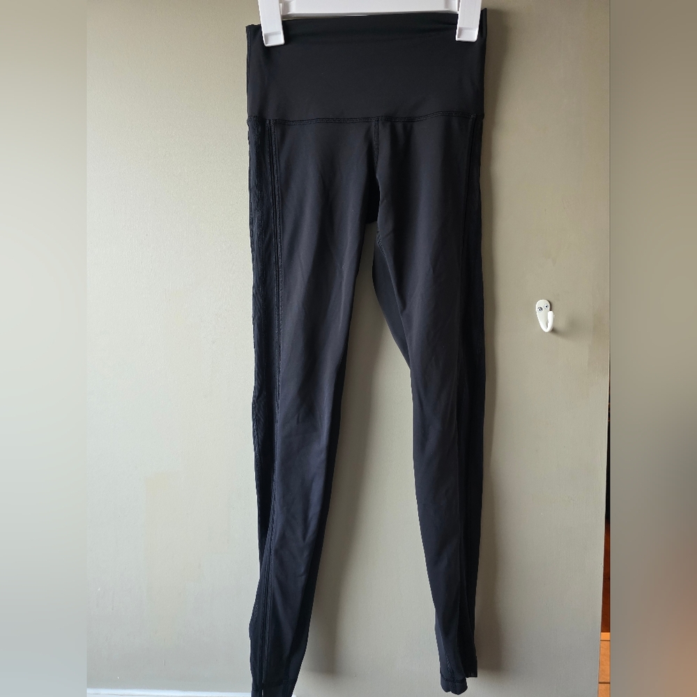 Lululemon High-Waisted Black Performance Leggings With Side Mesh Detailing
